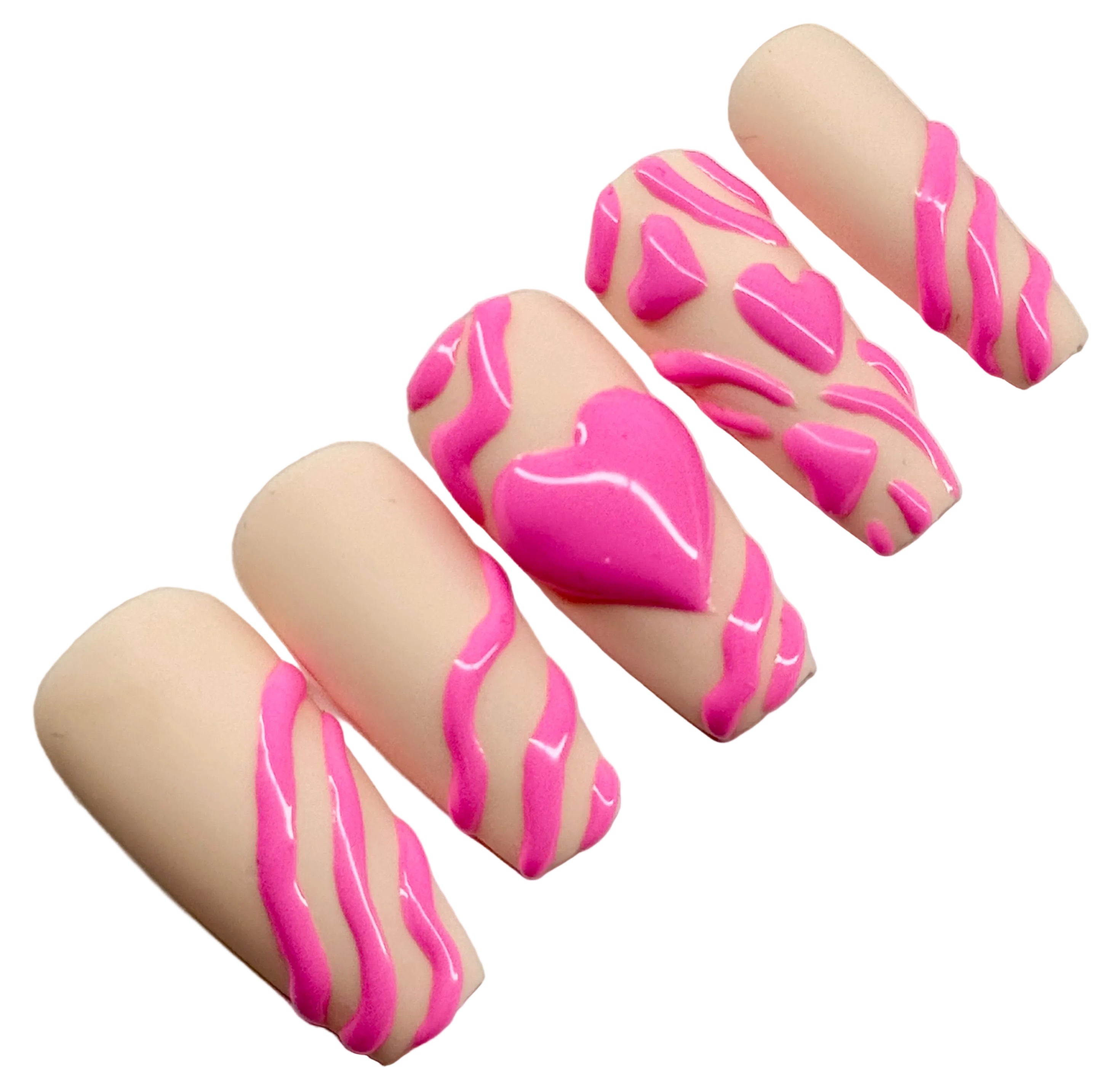 Nails with pink heart designs on a nude beige background