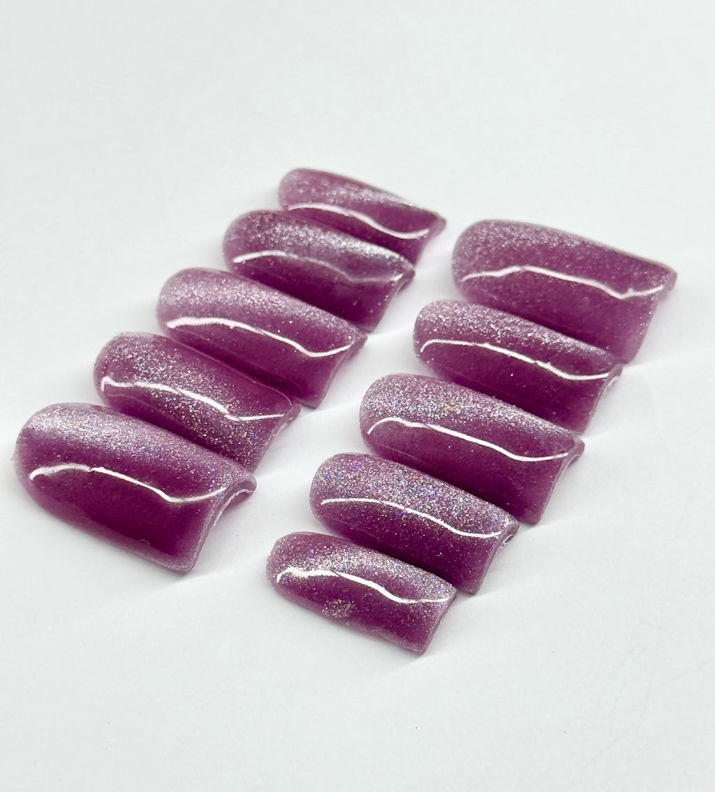 Purple cat eye nails 