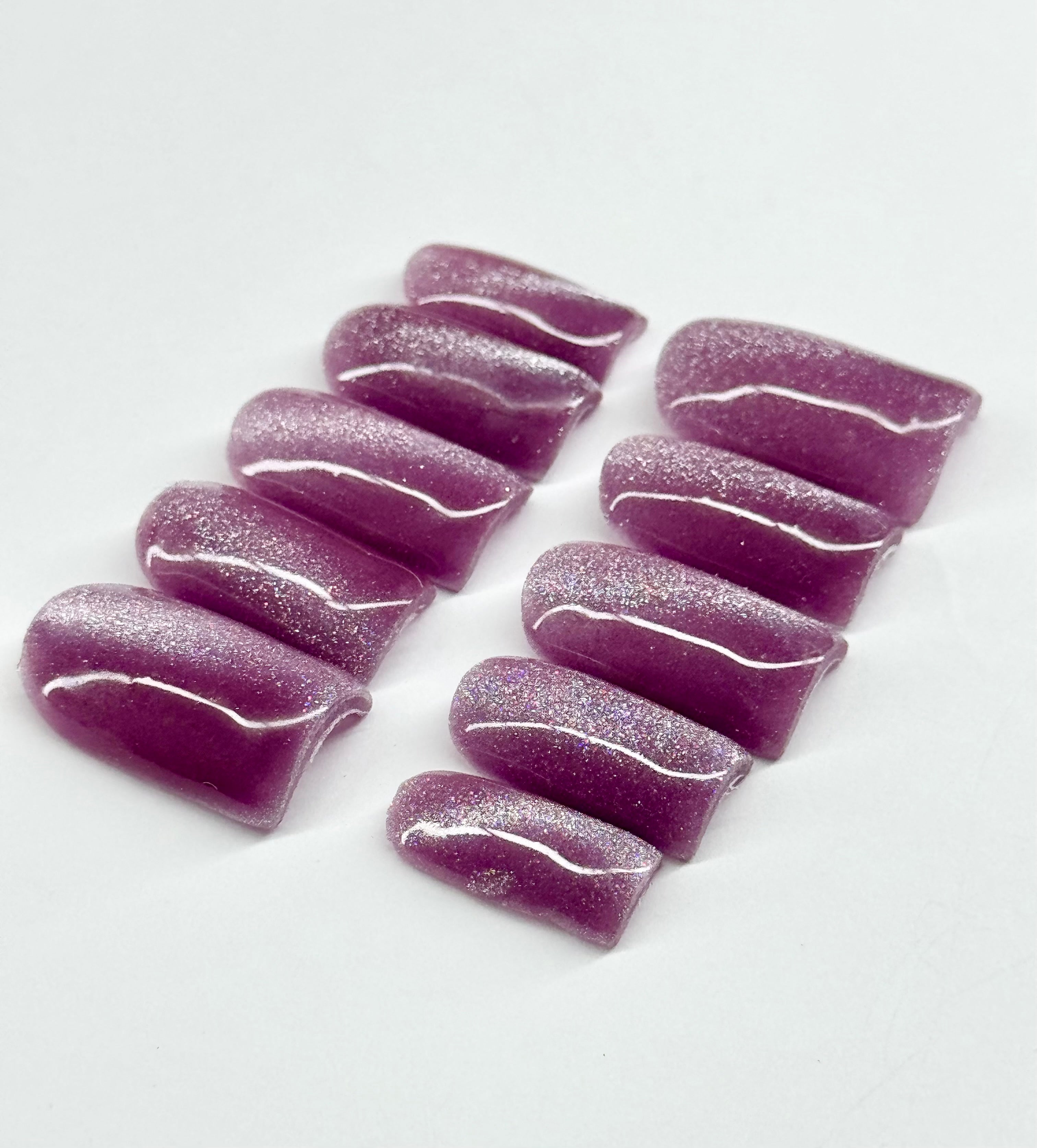 Purple cat eye nails 