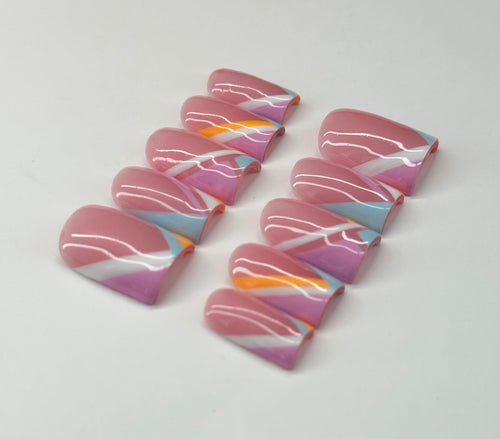 Colorful marbled nail art on a white background