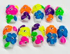 Colorful flower-shaped nail art decorations on a white background