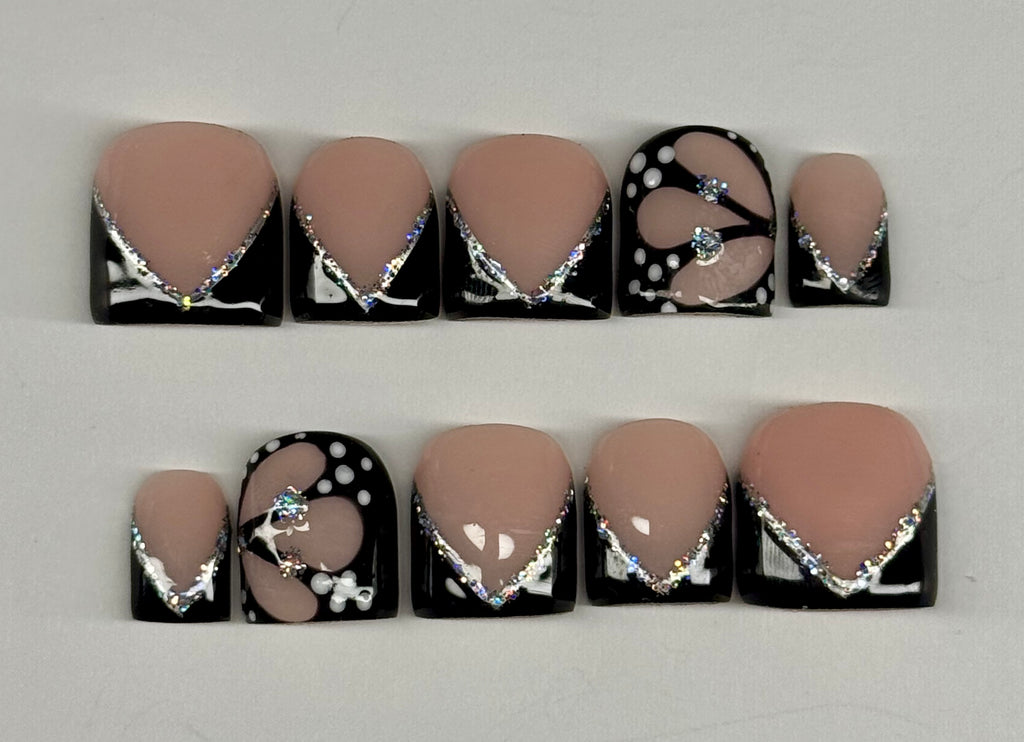 Set of nail art designs on a white background