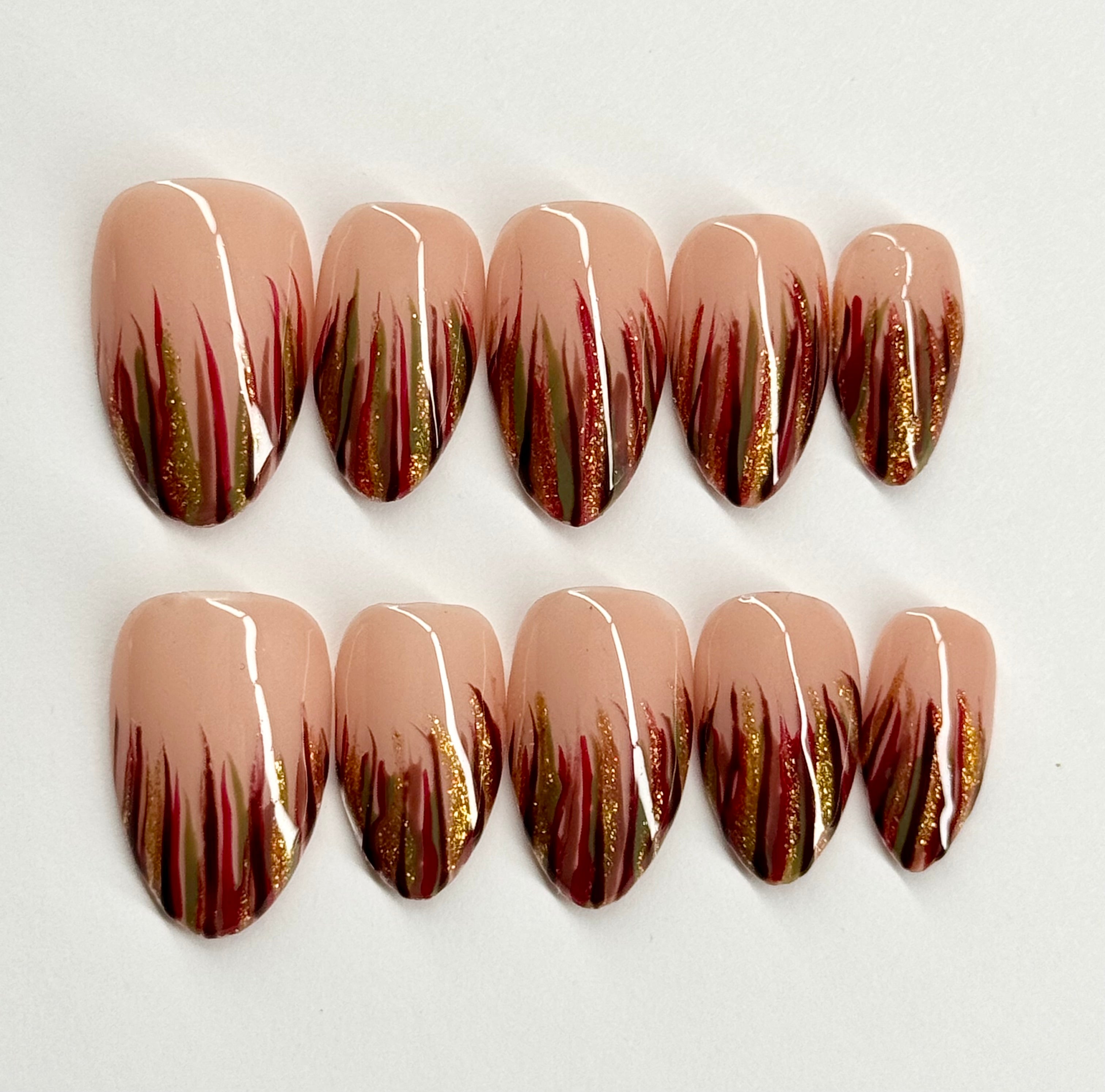 Nail art with gradient design on a white background