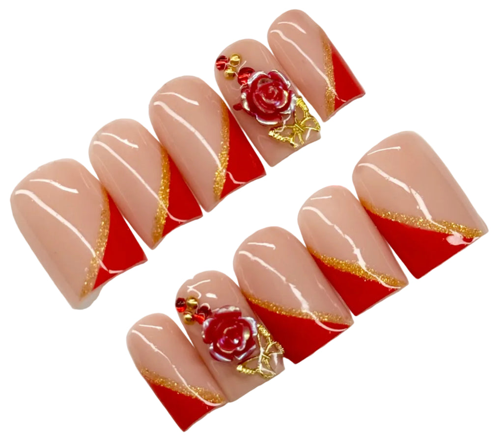 Set of nail art designs with red and gold accents on a white background