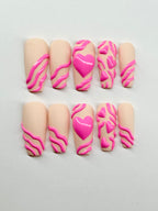 Set of decorative false nails with pink heart and wavy patterns 