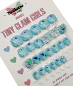 Set of blue nail art decorations on a display card with 'Nailene' branding.