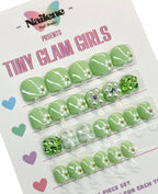 Packaging of green nail art decorations with 'Nailene' branding on a white background.