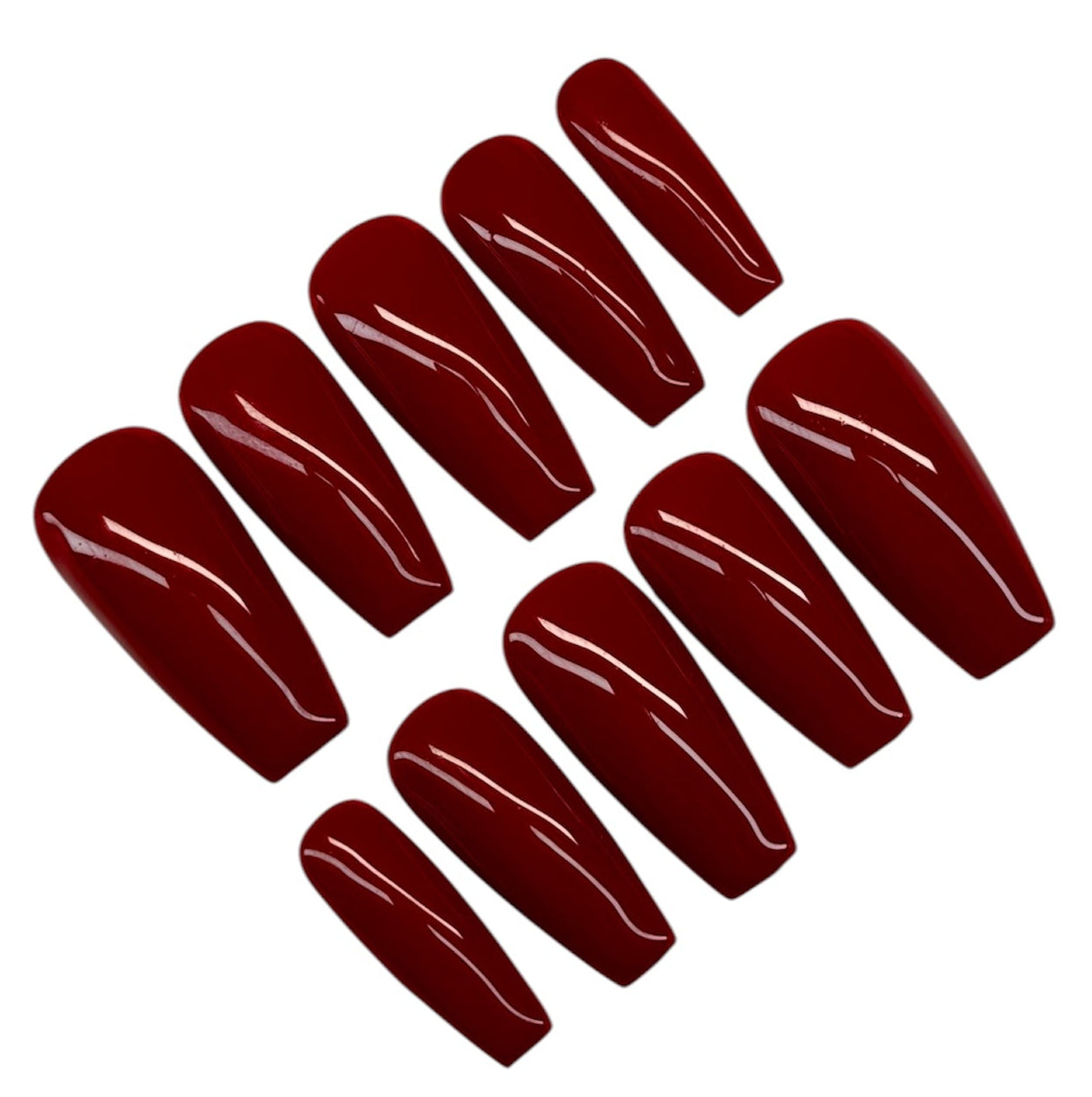 Set of dark red nail polish strips on a white background