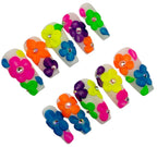 Colorful flower-shaped hair clips on a white background