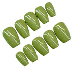 Set of green nail polish samples on a white background
