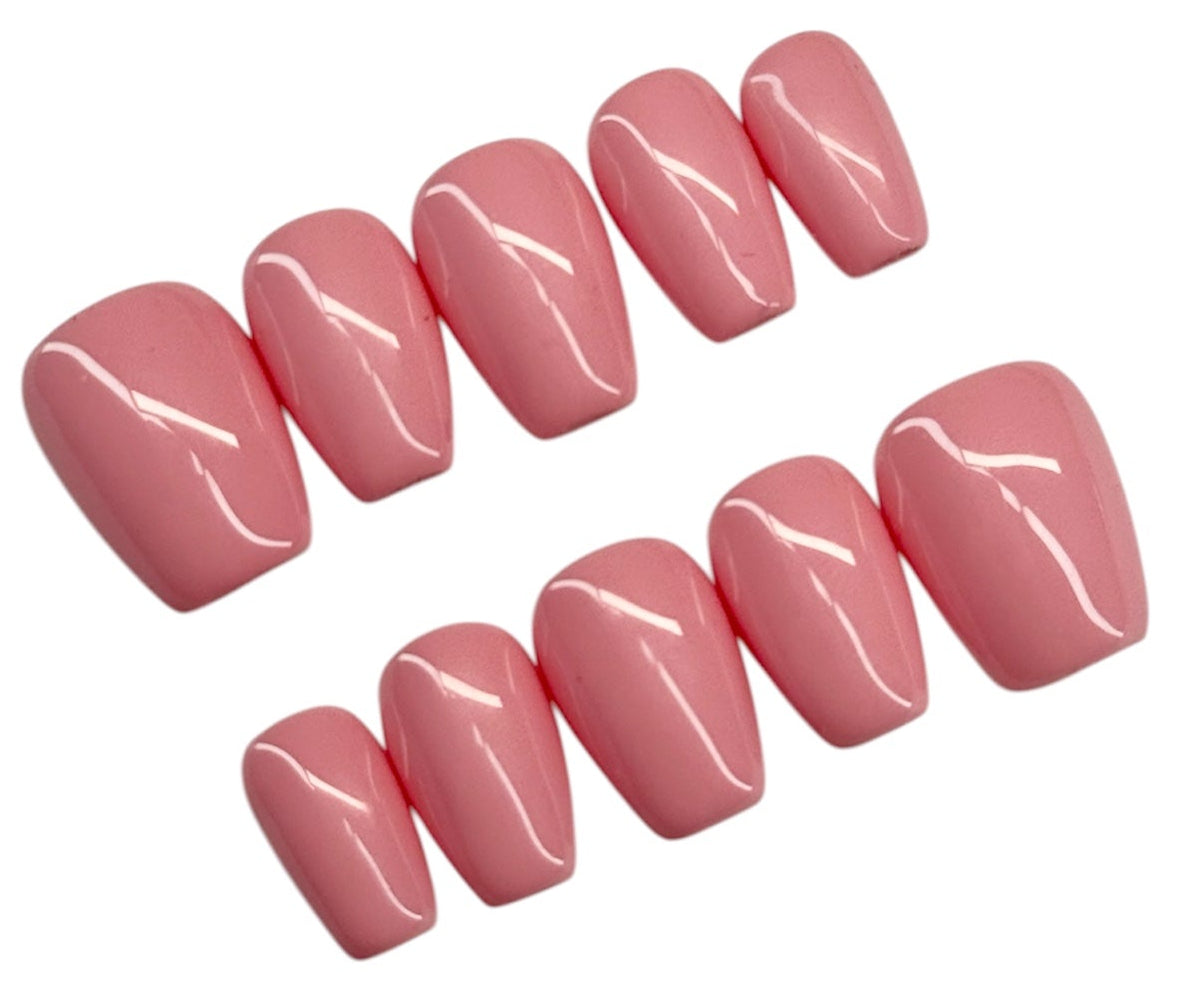 Set of pink nail polish on a white background