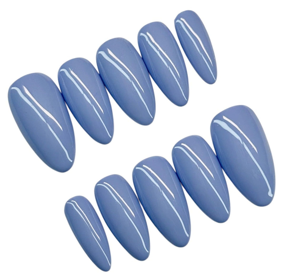 Set of blue nail polish strips on a white background