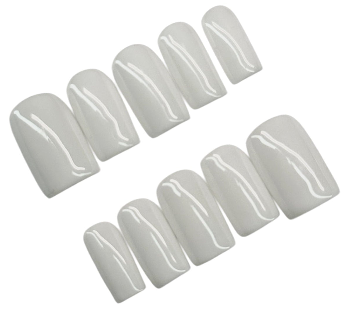 Set of white press-on nails on a white background
