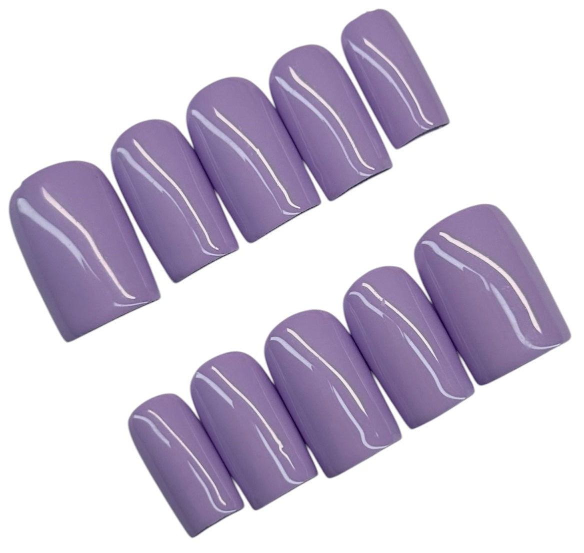 Set of purple nail tips with white stripes on a white background
