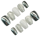 Set of silver chrome and milky white nail polish on a white background